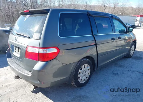 2007 Honda Odyssey Lx z USA, uszkodzony, nr VIN 5FNRL382X7B037283